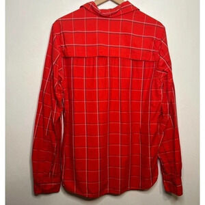 The North Face men’s long sleeve button down hiking shirt. Size medium